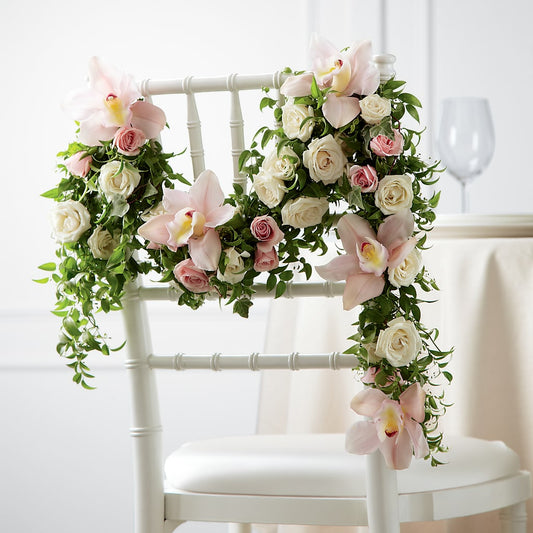 Orchid Rose Chair Décor –  Joyce Florist Of Dallas Inc, Dallas TX